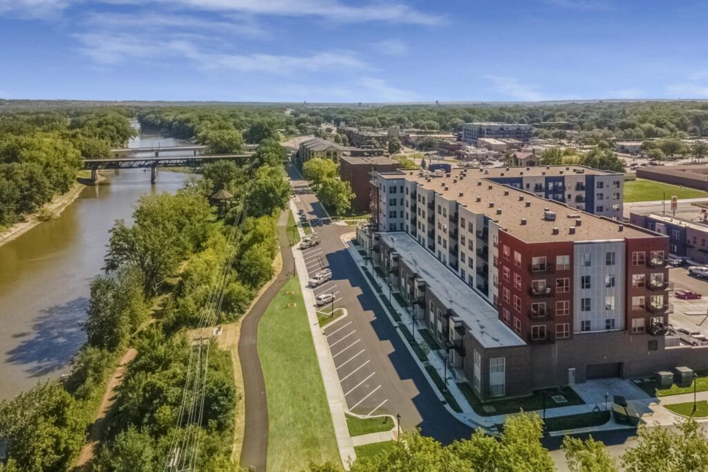 Aerial view of the City of Shakopee and Shakopee Flats, an apartment development located by the Minnesota River.
