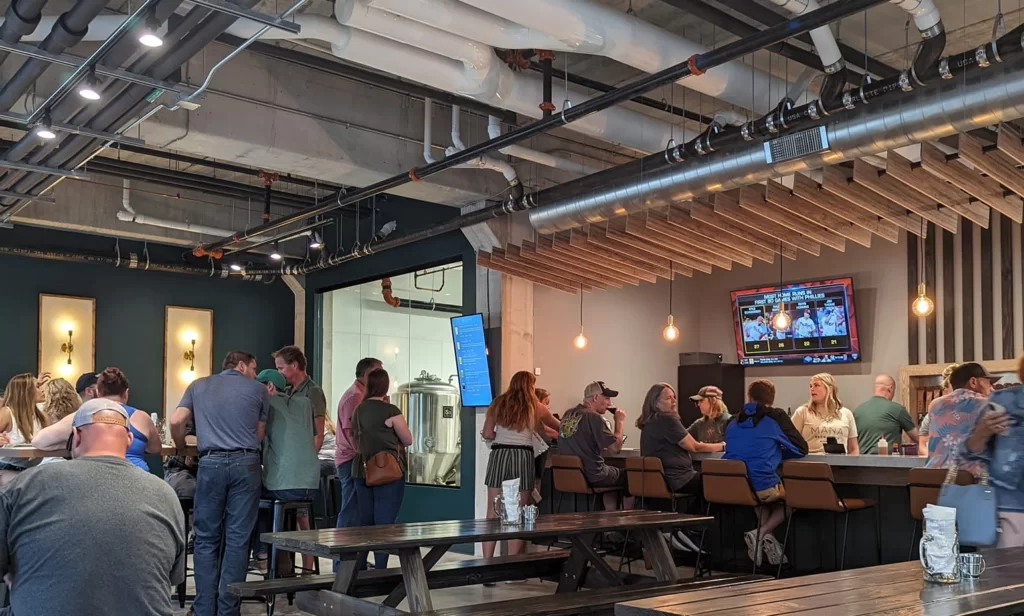 people gathering at mana brewing co